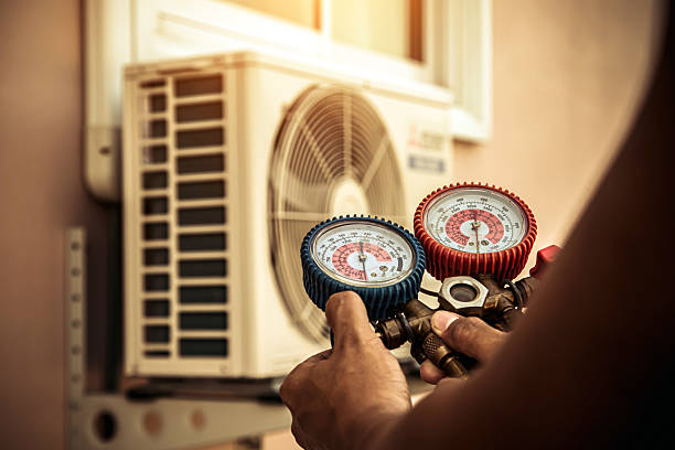 Professional Heat Pump Repair technician working in Oakley, KS